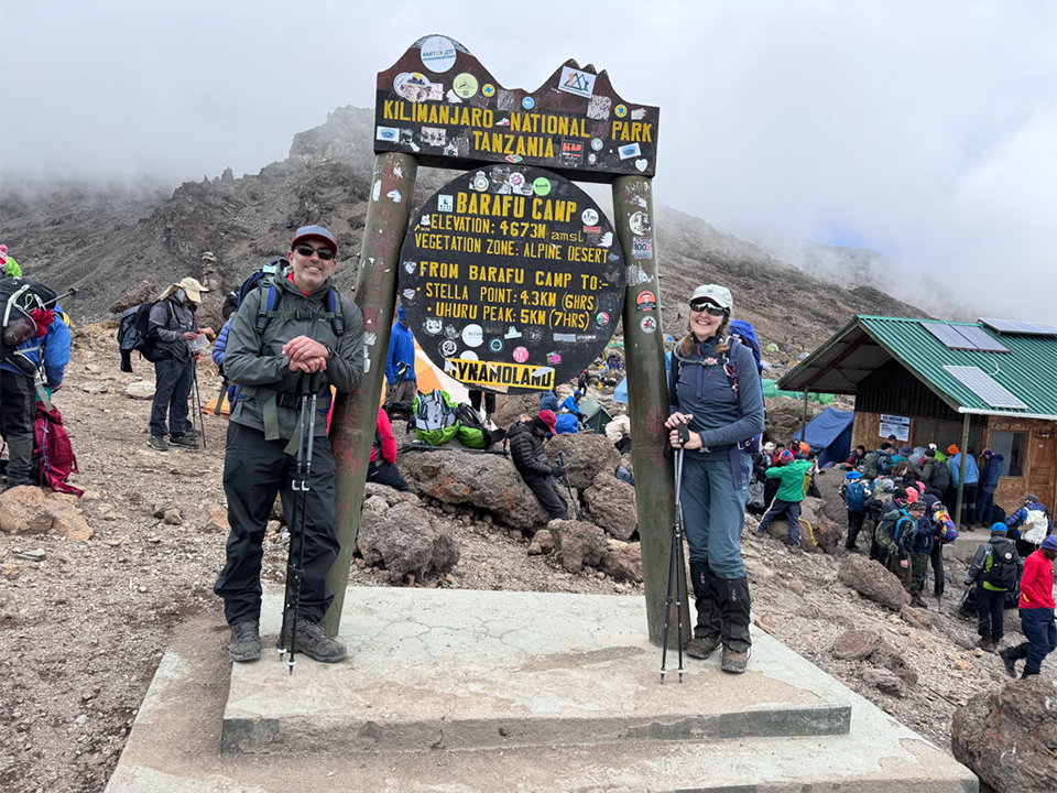 Carole and Sukhdev Climbing Kilimanjaro